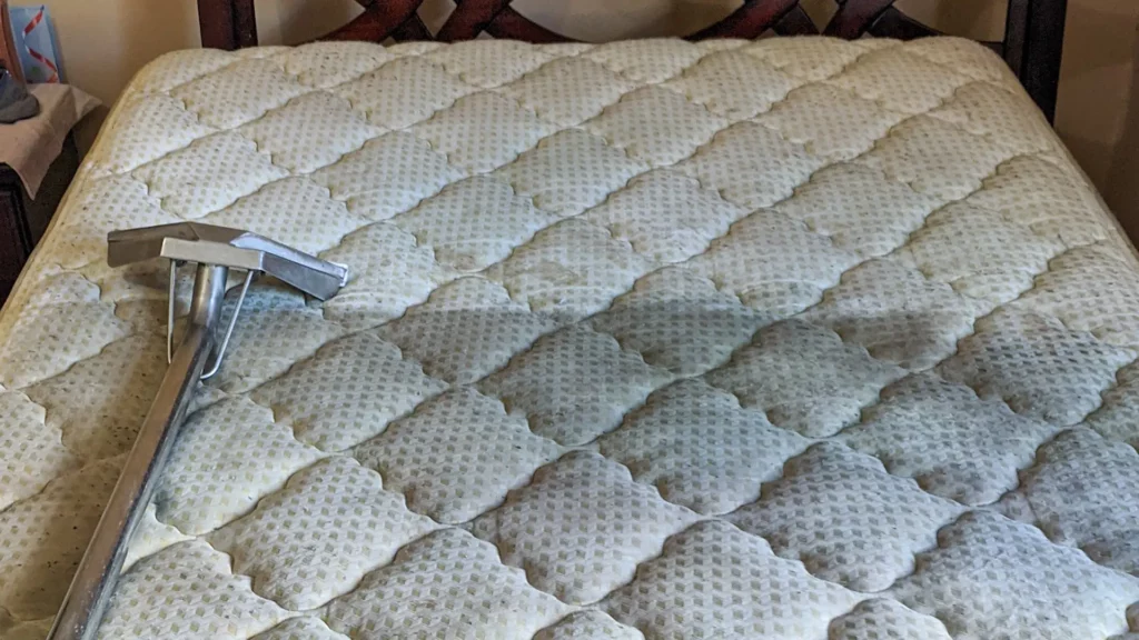 Dirty air mattress with a cleaning equipment on it